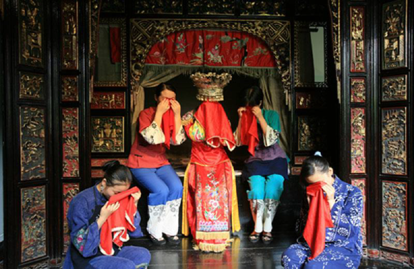 China: The bride practices a crying ritual